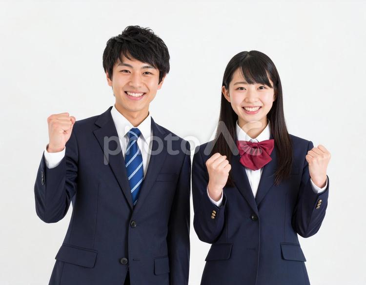ガッツポーズでエールを送る男女高校生 高校生,男女,生徒の写真素材