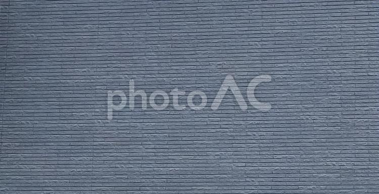 住宅の青いタイルレンガの壁テクスチャ素材 壁,タイル,外壁の写真素材