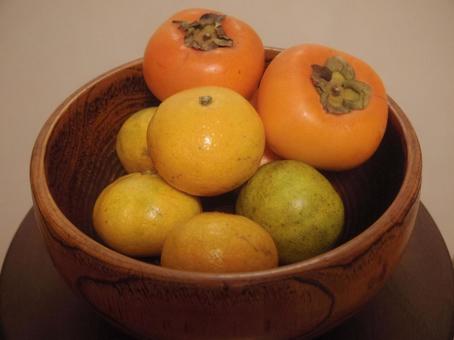 柿とみかんの写真