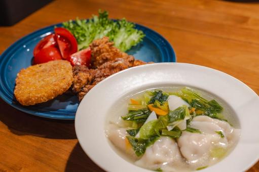 A hearty dinner of boiled dumplings and fried chicken, JPG