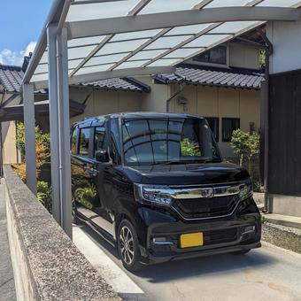 戸建てのカーポート 戸建てのカーポート 自宅,宅地,ヘッドライトの写真素材