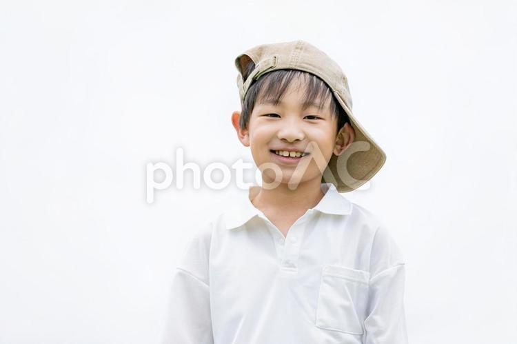 キャップをかぶった笑顔の男の子 男の子,笑顔,帽子の写真素材