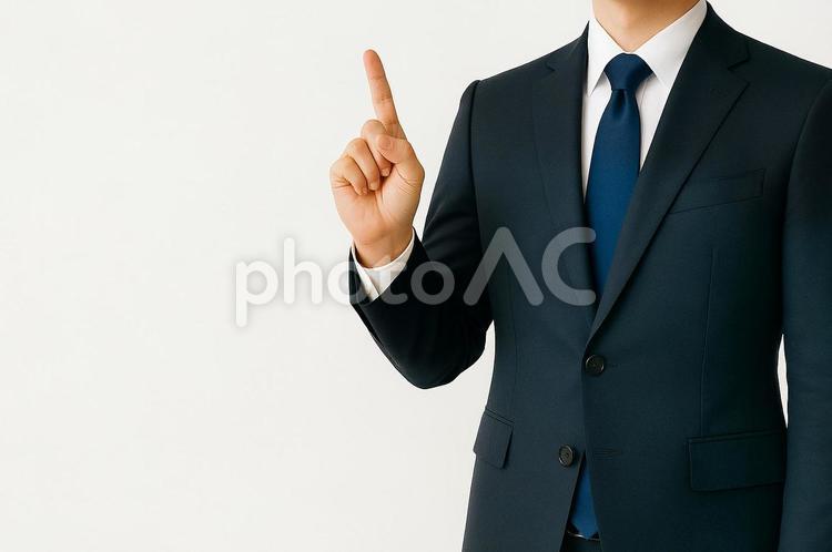 指を立てているサラリーマン ビジネス,スーツ,男性の写真素材