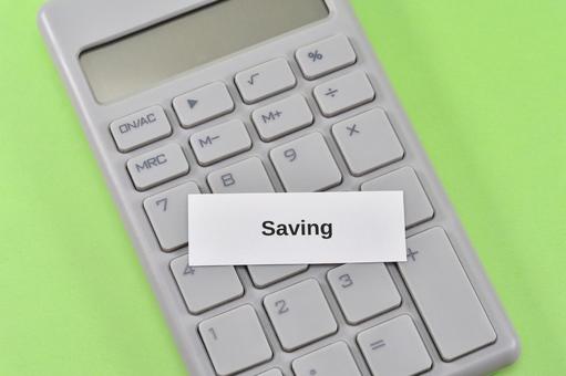 savingと電卓で節約のイメージ savingと電卓で節約のイメージ saving,節約,家計の写真素材