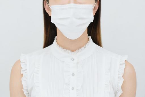 Young woman wearing a mask Young woman wearing a mask