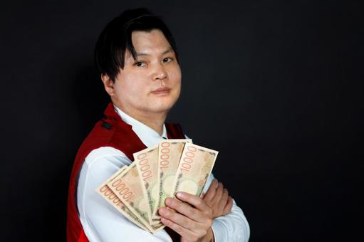 お金を持つ男性 お金を持つ男性の写真