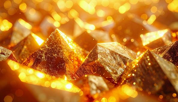 金色の多面体結晶とキラキラした背景 金色の多面体結晶とキラキラした背景の写真