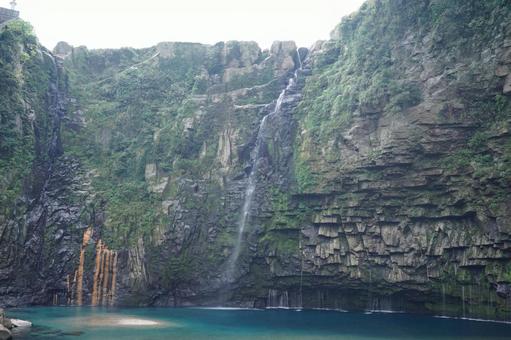 A majestic waterfall cascading down a cliff, JPG A majestic waterfall cascading down a cliff, JPG