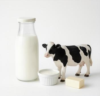 牛乳瓶と牛の模型 牛乳瓶と牛の模型 の写真