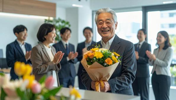 定年退職するベテラン社員 定年退職するベテラン社員の写真