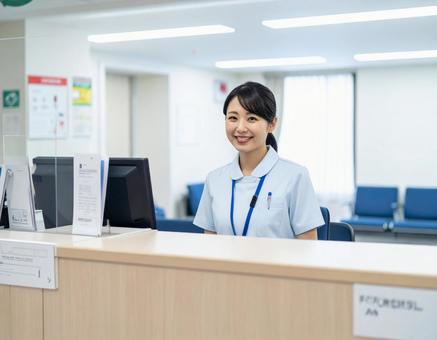 病院の受付コーナーで笑顔で迎える受付嬢 病院の受付コーナーで笑顔で迎える受付嬢の写真
