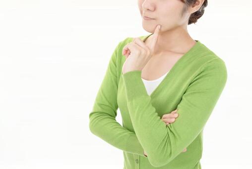 悩む女性 悩む女性の写真