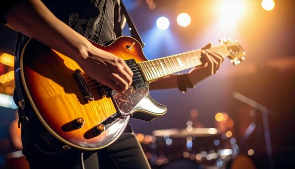 エレキギターを演奏するギターリスト エレキギターを演奏するギターリストの写真
