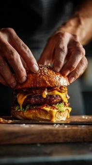 ハンバーガーとつくる手 ハンバーガーとつくる手の写真