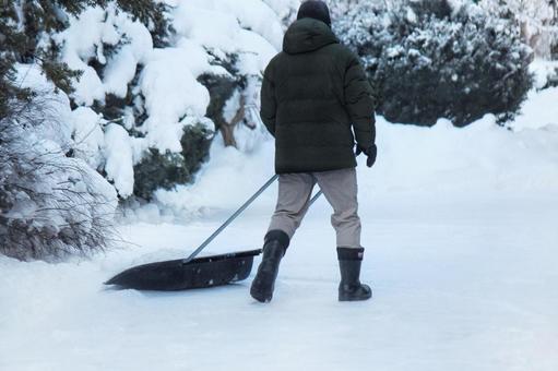 北欧 雪かきをする人 4 雪かき,大雪,雪の写真素材