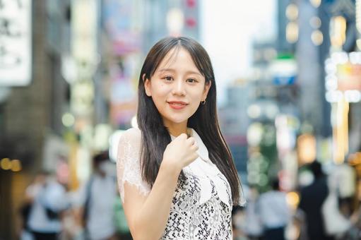 Portrait of a woman in downtown, outdoors, bright, student, JPG