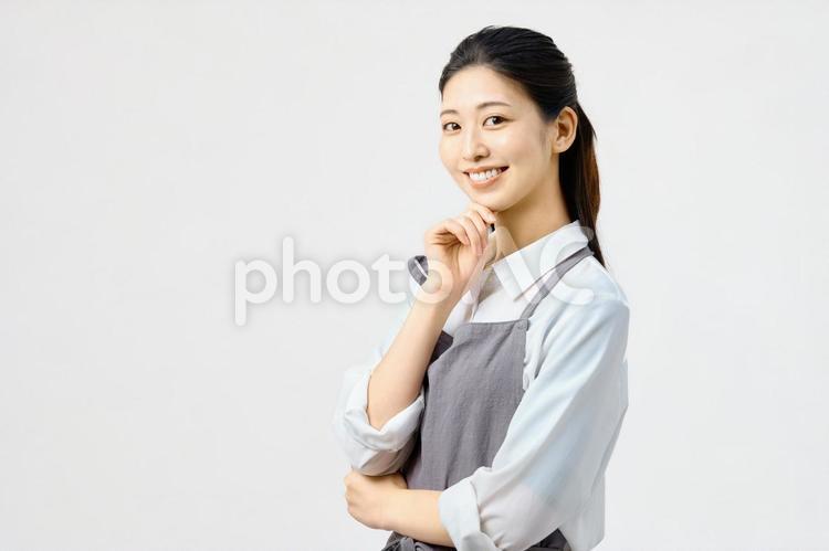 主婦　笑顔　エプロン 主婦,エプロン,家事代行の写真素材
