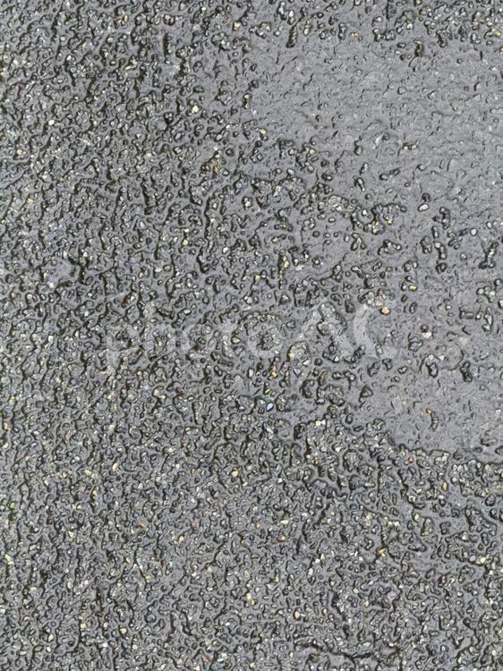 雨に濡れた荒い舗装路 舗装路,荒い,雨の写真素材