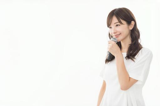 若い女性 マイク 若い女性 マイクの写真