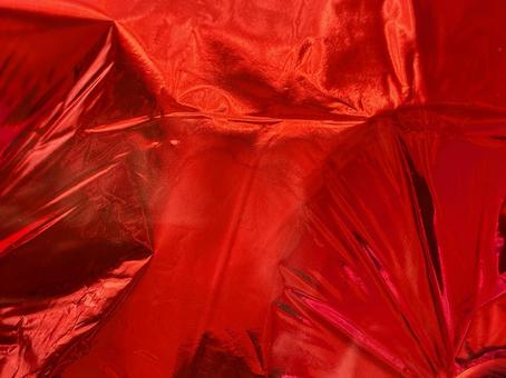 赤いホイルのシワ テクスチャ,シワ,しわくちゃの写真素材