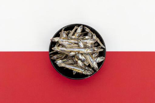 紅白背景と田作り 田作り,ごまめ,おせちの写真素材