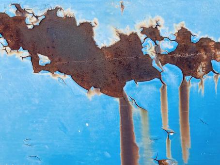 錆びたブルーペイント手摺りテクスチャーの写真