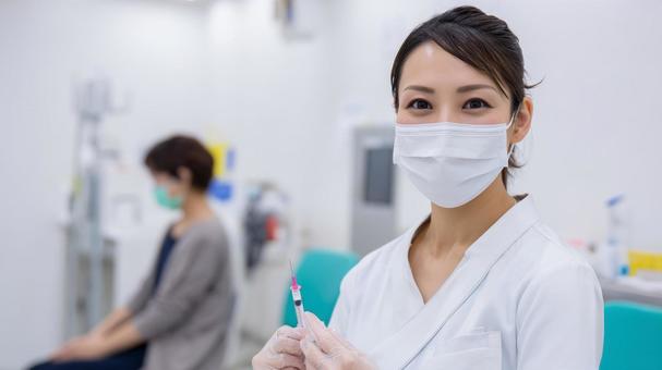 優しい看護師とワクチン接種の瞬間 優しい看護師とワクチン接種の瞬間の写真