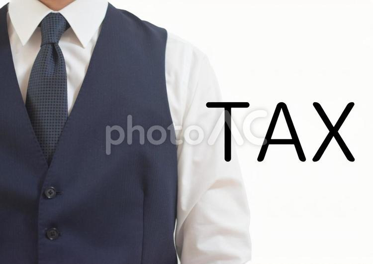 ジャケットを着たビジネスマンとタックス タックス,tax,税金の写真素材