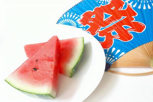 夏のイメージ すいかとうちわ 夏のイメージ すいかとうちわ 夏,盛夏,夏のイメージの写真素材