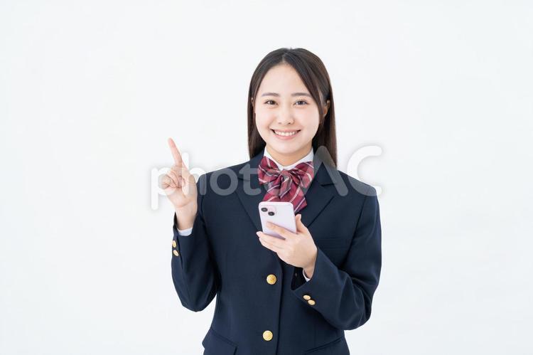 スマホでおすすめする女子高生 女子高生,おすすめ,スマホの写真素材