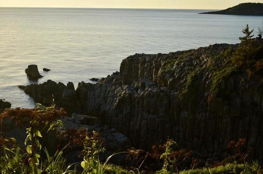 The Sea of Japan and cliffs seen from Tojinbo in Fukui Prefecture in the evening, JPG