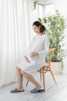 Pregnant woman touching her tummy, pregnant woman, baby, pregnancy, JPG