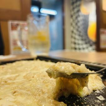 ハイボールのお供にもんじゃ焼き ハイボールのお供にもんじゃ焼きの写真