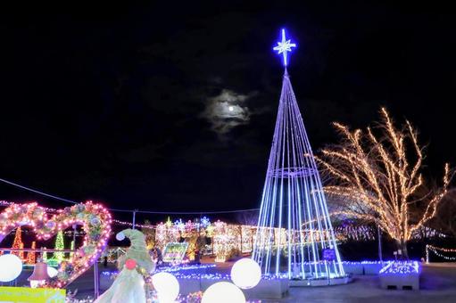 とっとり花回廊のイルミネーションと冬の月 イルミネーション,とっとり花回廊,ライトアップの写真素材