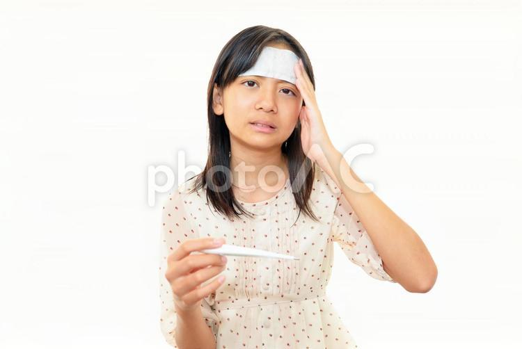 風邪にり患した女の子 子供,女,女性の写真素材