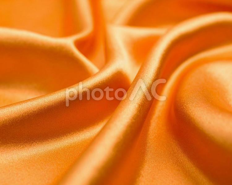 光沢のあるオレンジ シルク,オレンジ,テクスチャの写真素材