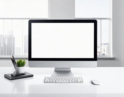 オフィスのパソコンの白い画面の写真素材の写真