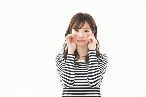 若い女性 ボーダー 泣く 若い女性 ボーダー 泣くの写真