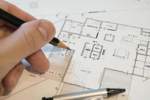 新築注文住宅の間取図を作成中の手元 新築注文住宅の間取図を作成中の手元 設計図,間取り図,計画の写真素材