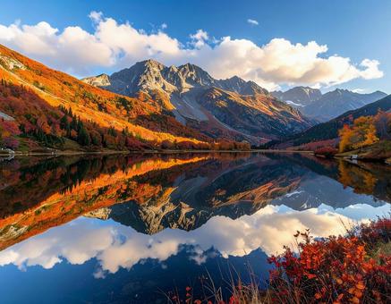 紅葉する山が映る湖 紅葉する山が映る湖の写真