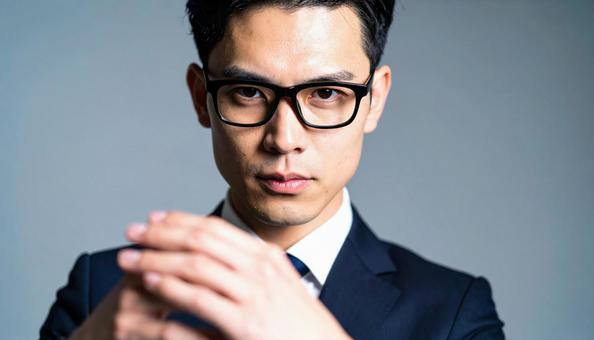 眼鏡をかけた知的で真面目そうな若い男性 眼鏡をかけた知的で真面目そうな若い男性の写真
