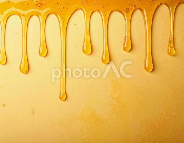 垂れたはちみつ はちみつ,ハニー,液体の写真素材