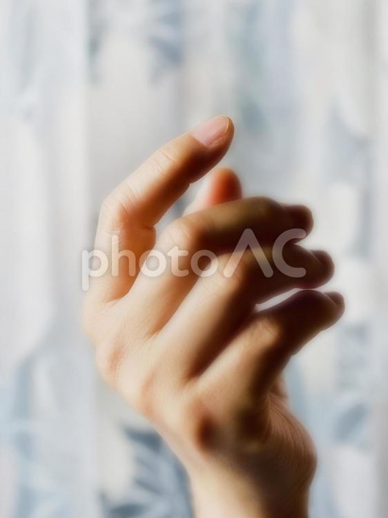 手だけのシリーズ けだるい午後のイメージ 手,イメージ,指の写真素材