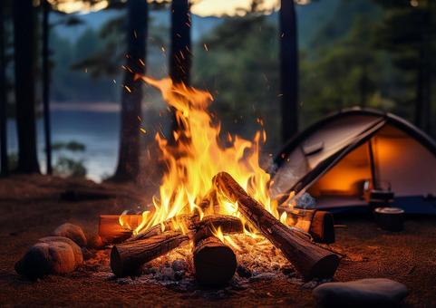 キャンプで焚火の写真