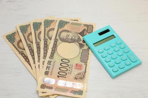 お札と電卓 お札,紙幣,マネーの写真素材