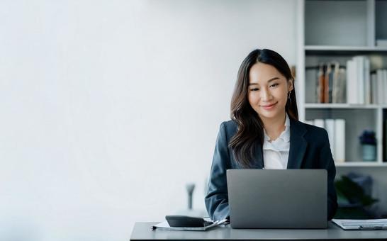 Female business person working on a computer, female, computer, pc, JPG