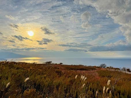 歌島高原の夕日に輝く秋景色 歌島高原,島牧村,北海道の写真素材