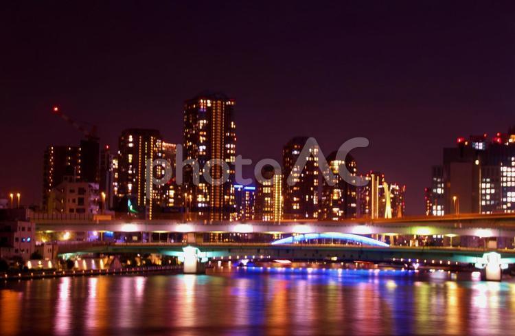 夜の永代橋4 高層マンション,隅田川,ライトアップの写真素材
