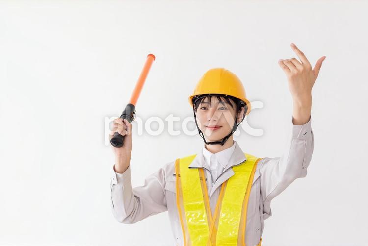 反射ベストを着た警備員　 女性,人物,日本人の写真素材