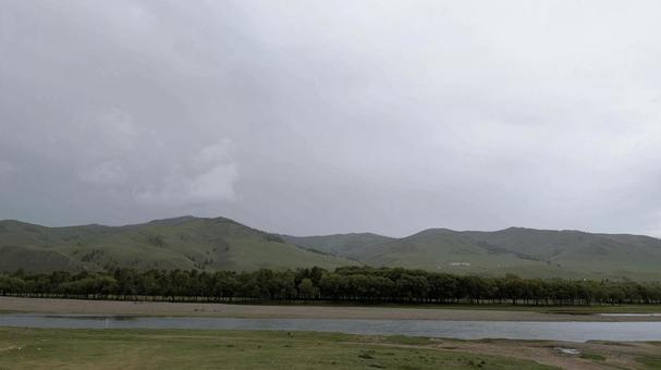 夏のモンゴルの草原・川・なだらかな山 モンゴル,大自然,山の写真素材
